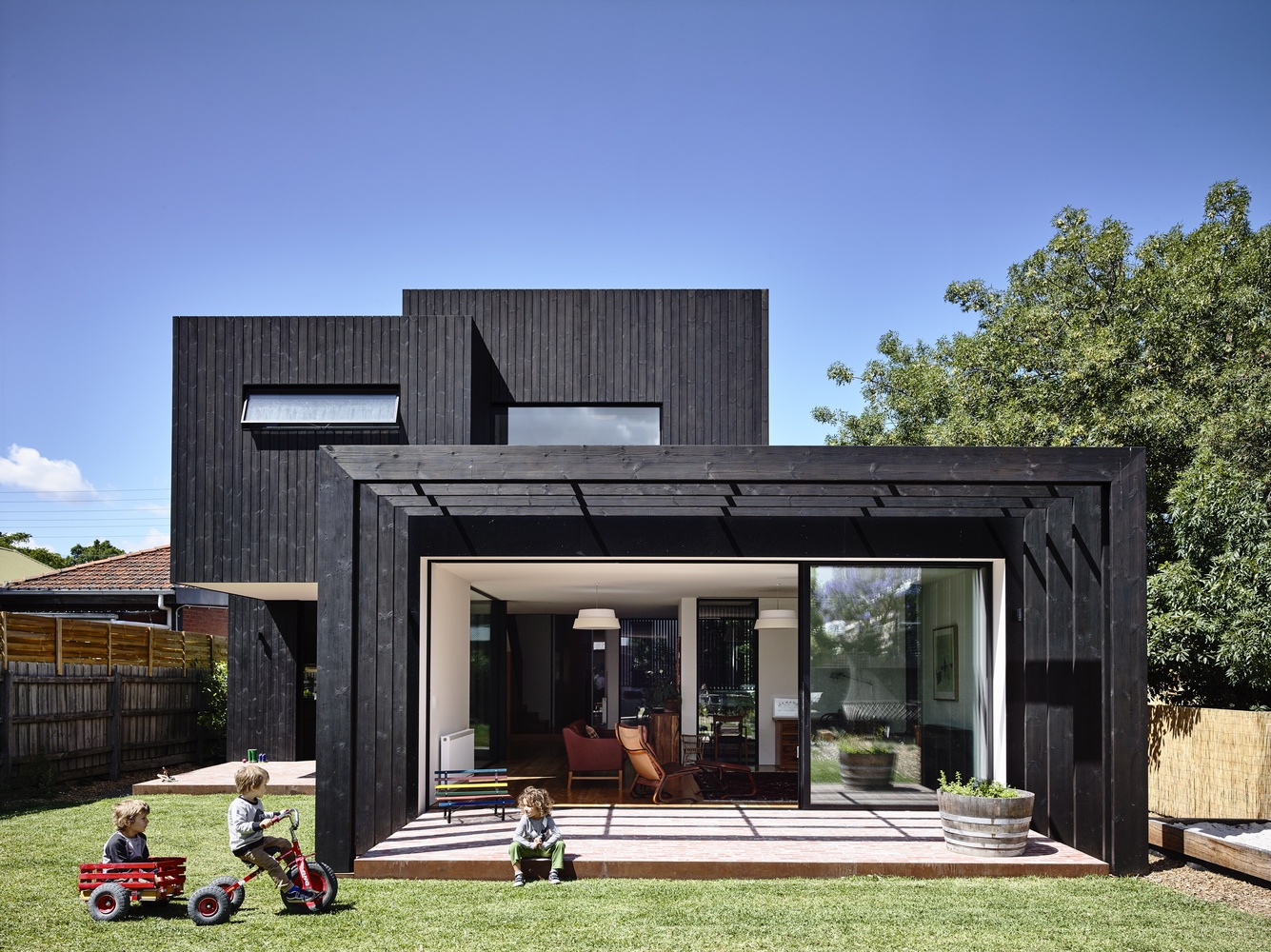 An Elegant Black Timber Extension Compliments a 19th Century Home